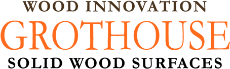 Grothouse Wood Innovation logo with orange Grothouse text and “Solid Wood Surfaces” tagline