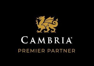 Cambria Premier Partner logo with gold lion emblem on black background