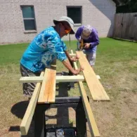 working on fence