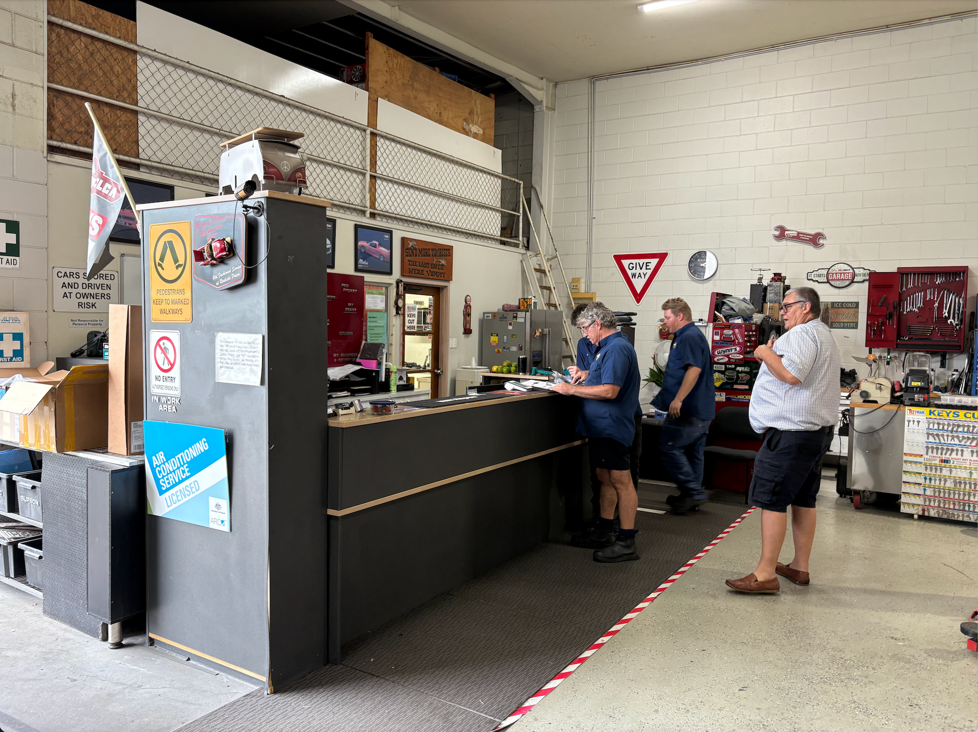 A Row of Cars Are Parked Next to Each Other in A Parking Lot — Monypenny Mechanical in Bungalow, QLD