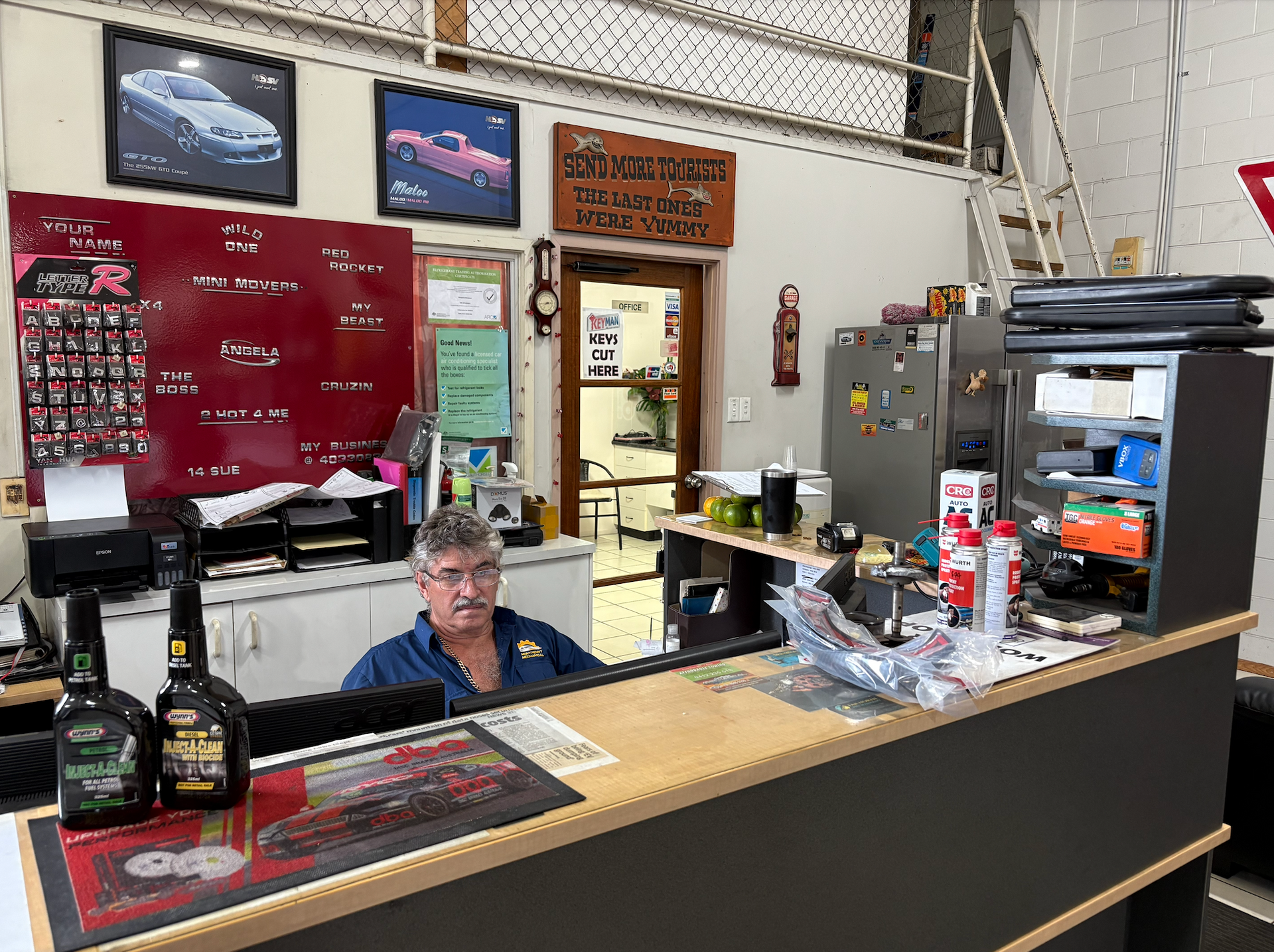 Man Behind Front Desk — Monypenny Mechanical in Smithfield, QLD