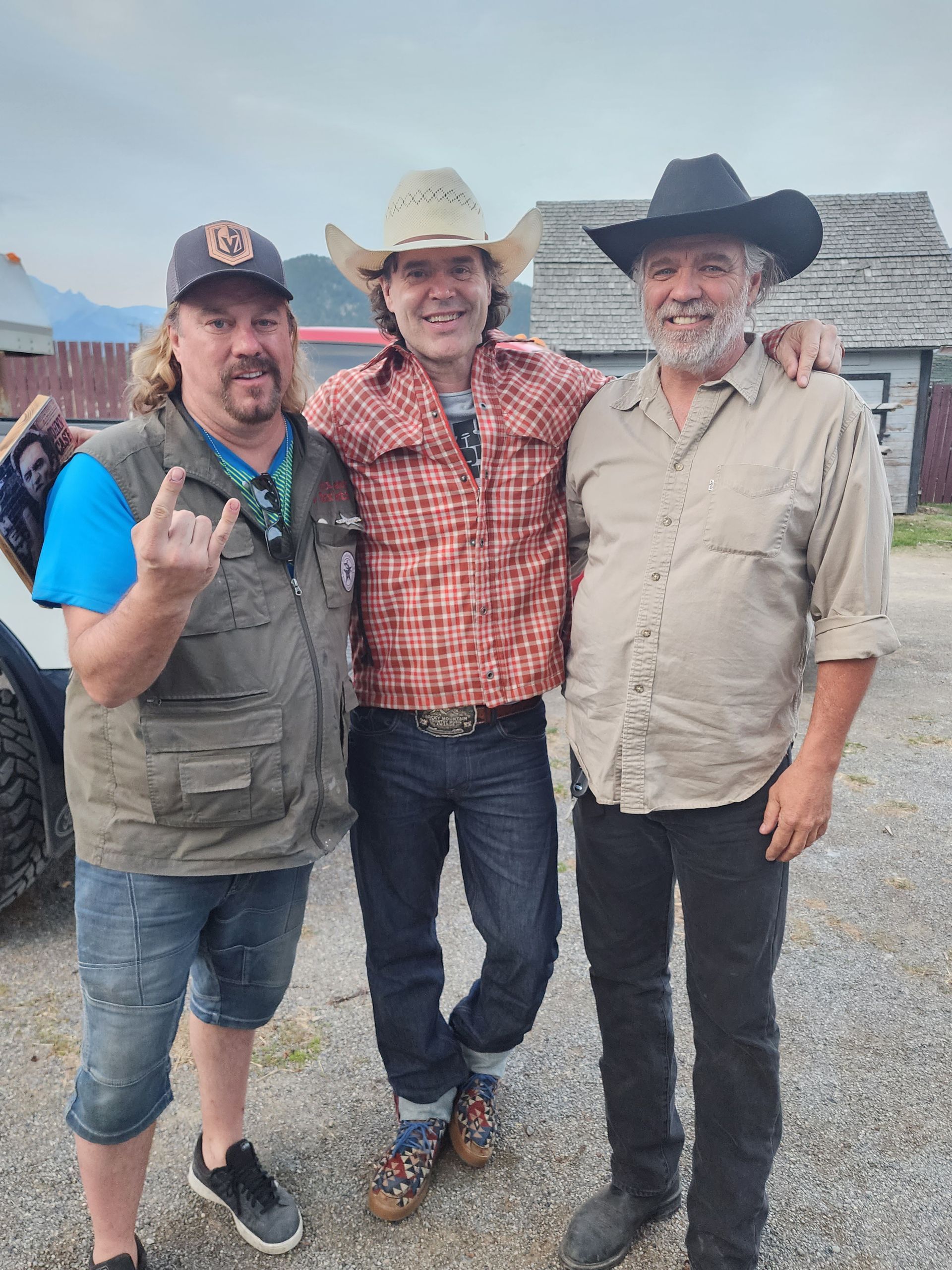 Banff, AB: artist Chris Tutty, musician Corb Lund with Matt Paproski.