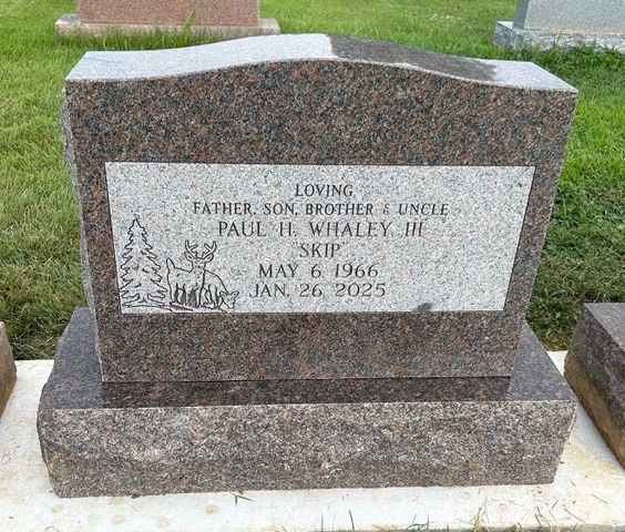 A granite gravestone for Paul H. Whaley Jr., nicknamed