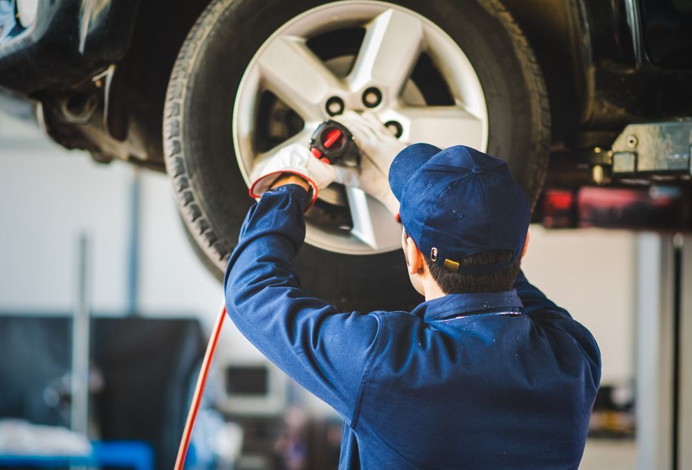 Mechanic Changing car Wheel - Car Repairs in Kangaroo Flat, VIC