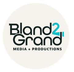 Bland2Grand Media + Productions logo in black and teal on a light beige circle