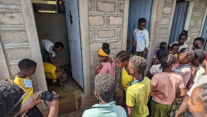 Demonstration of latrine cleaning