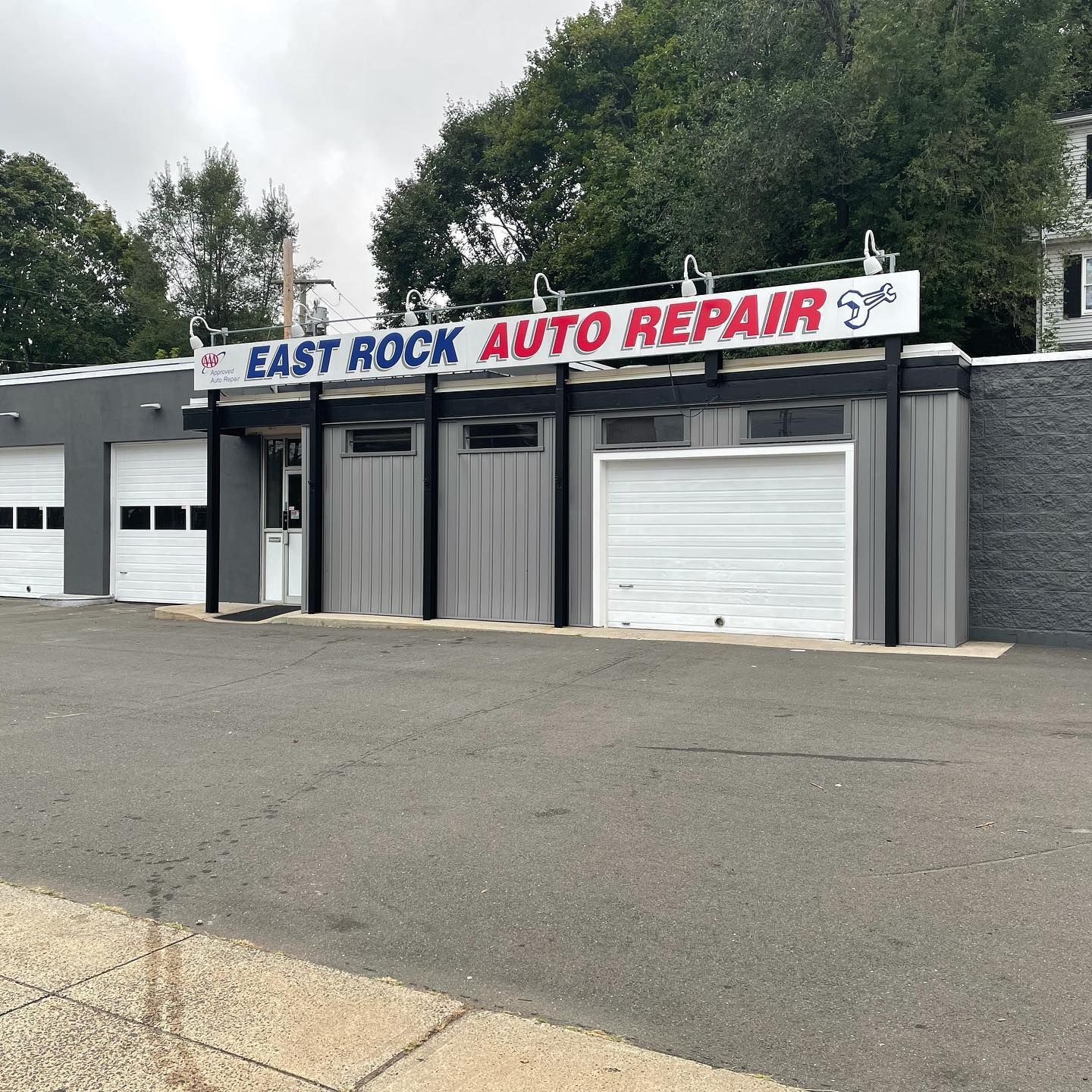 Exterior View Of East Rock Auto Repair Building With Signage | East Rock Auto Repair