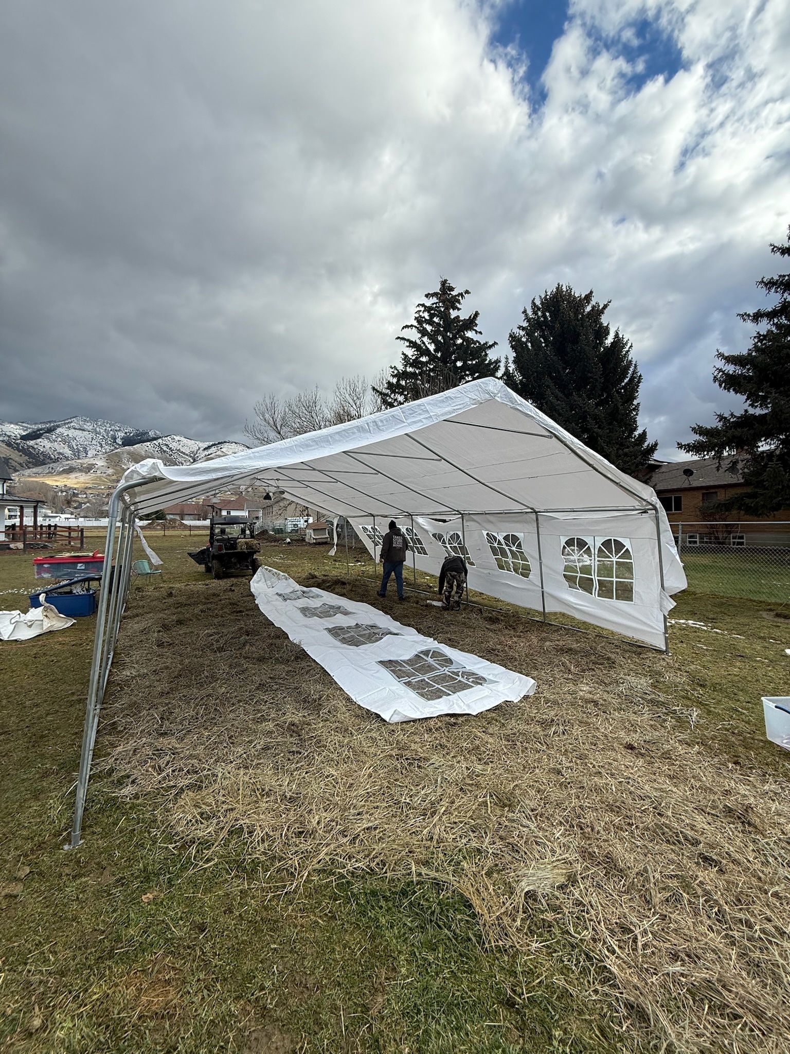 Event tent and shade rental set up outdoors for weather protection