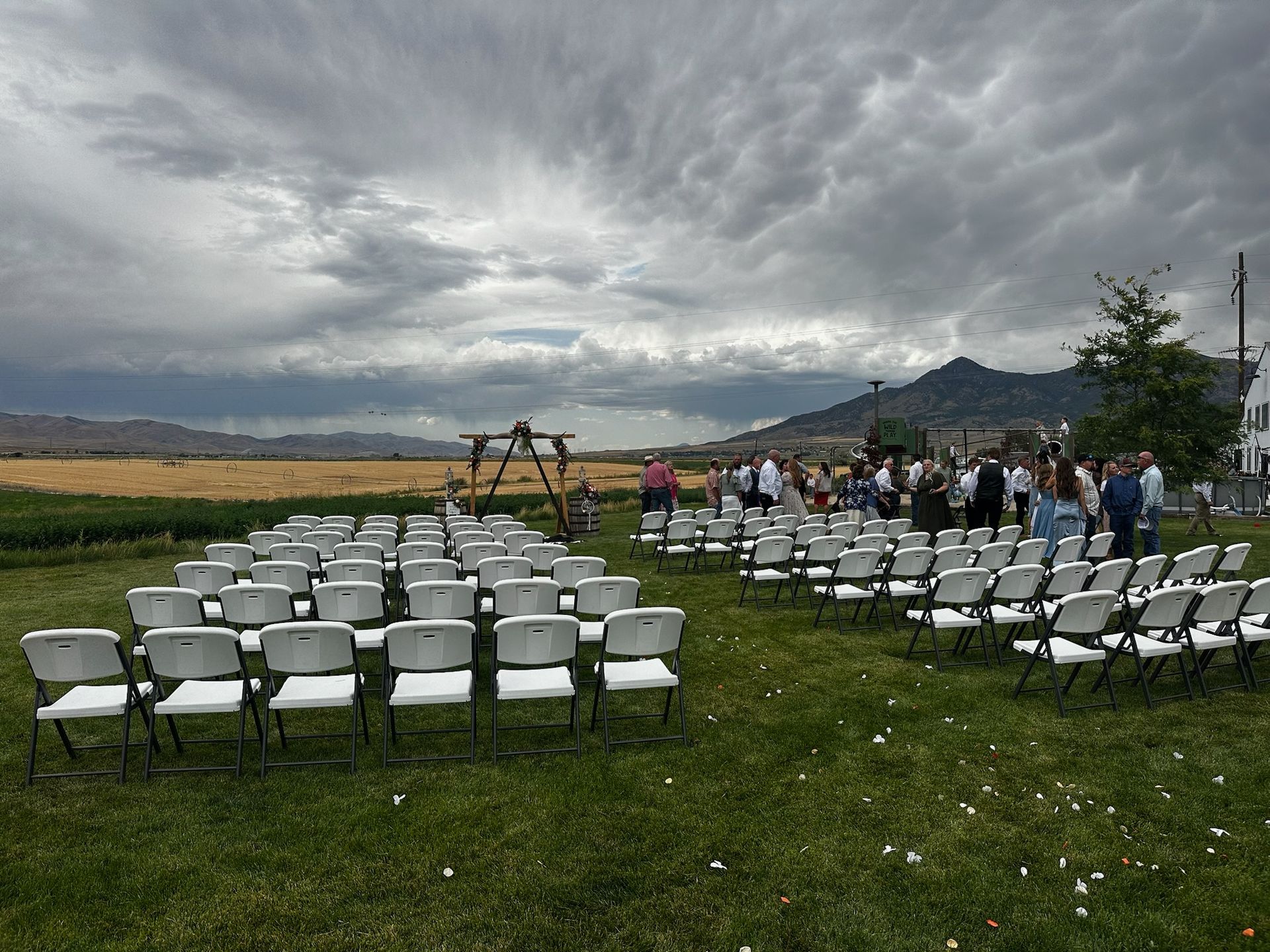 Wedding chair rentals set up outdoors for a ceremony in Logan Utah