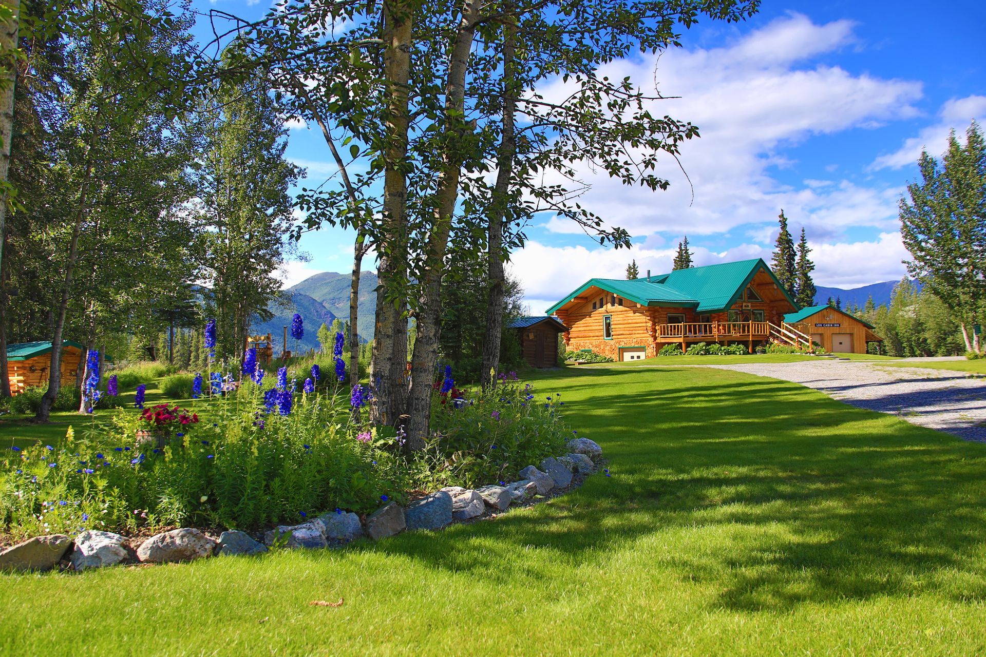 Main lodge and grounds at Log Cabin Wilderness Lodge