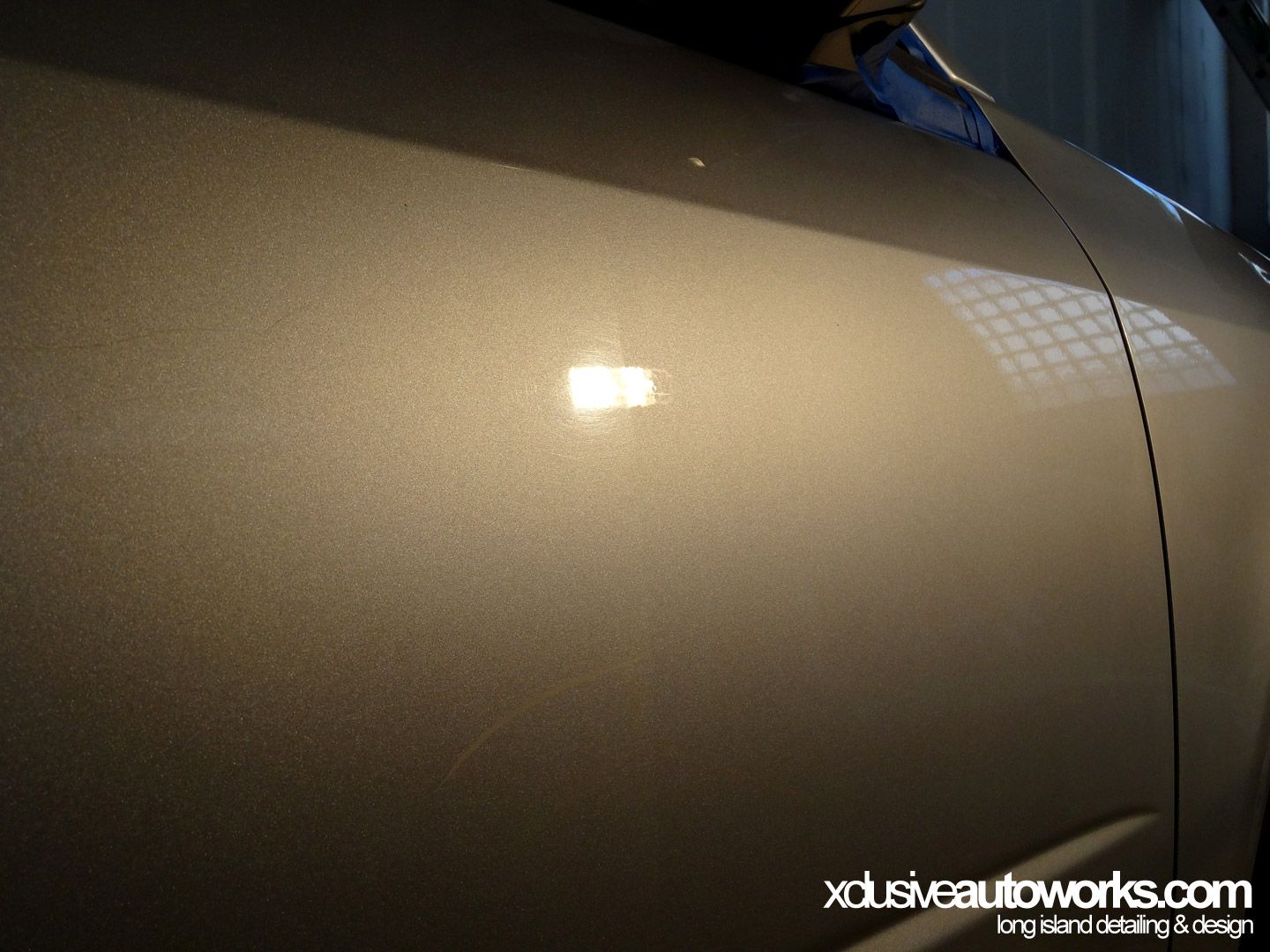 A close up of a car with xdusveautoworks.com written on the bottom