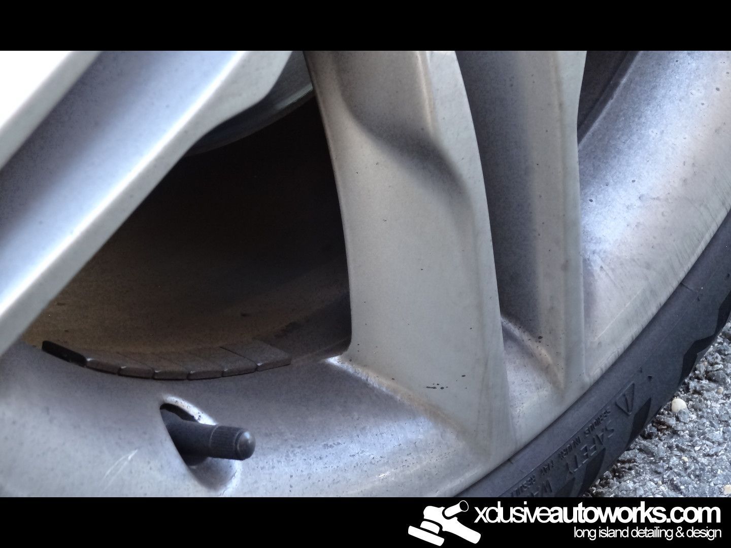 A close up of a tire with xdusveautoworks.com written on the bottom