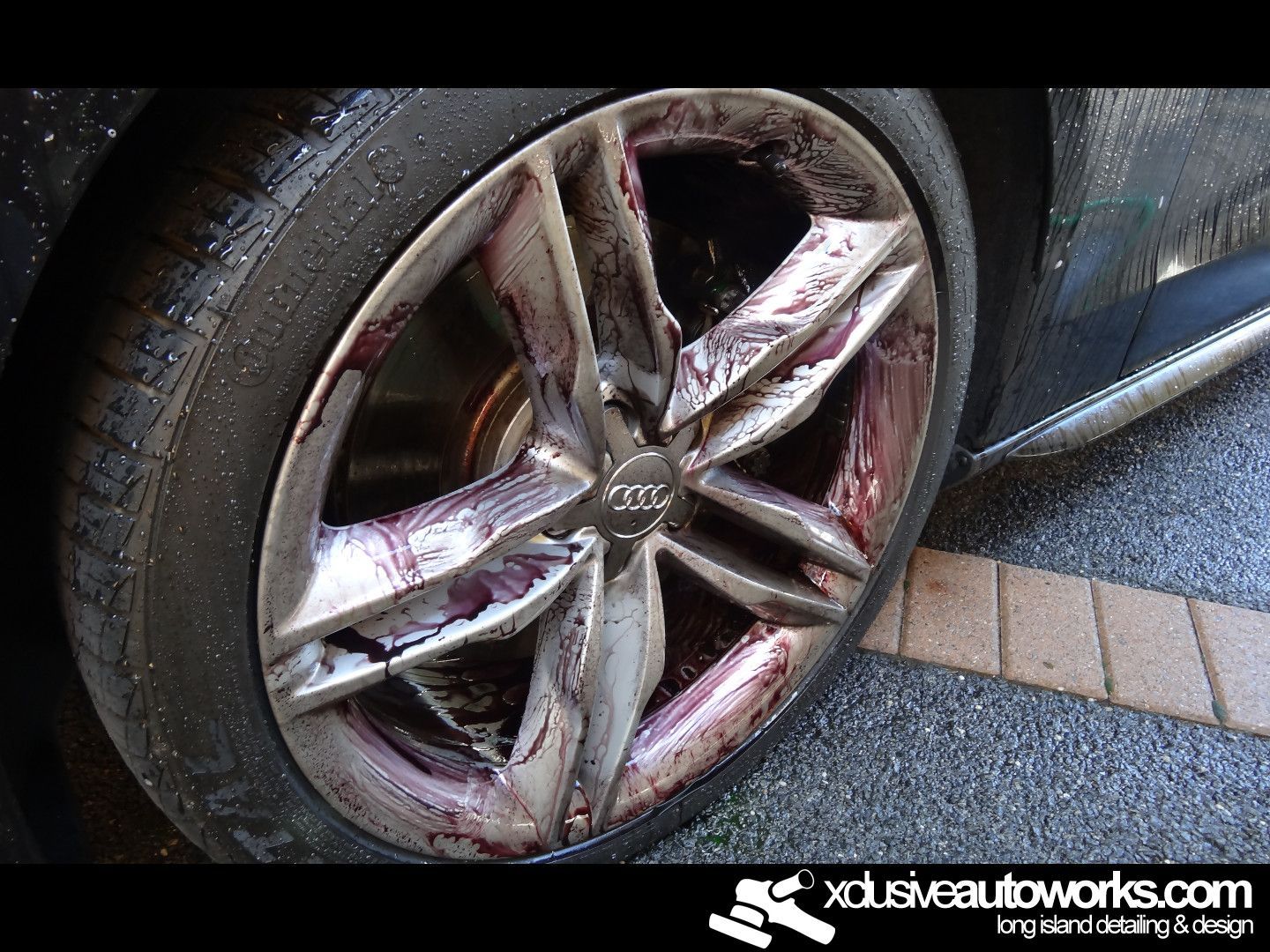 A close up of a car wheel with xdusveautoworks.com written on the bottom