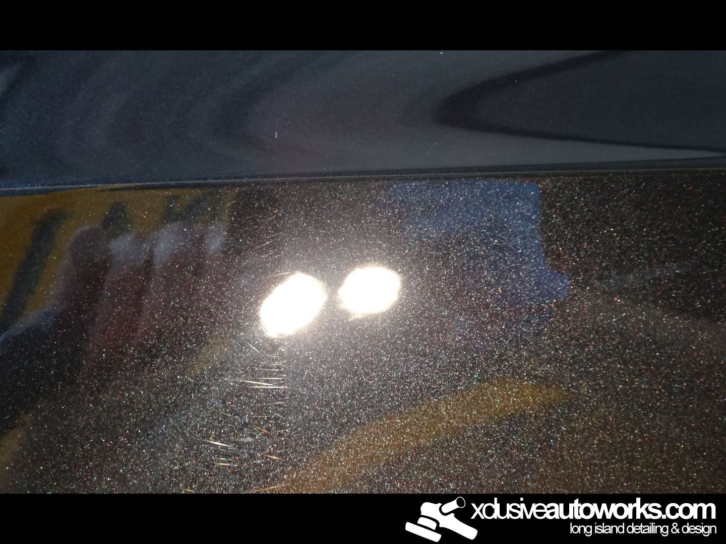 A close up of a car with xdusveautoworks.com written on the bottom