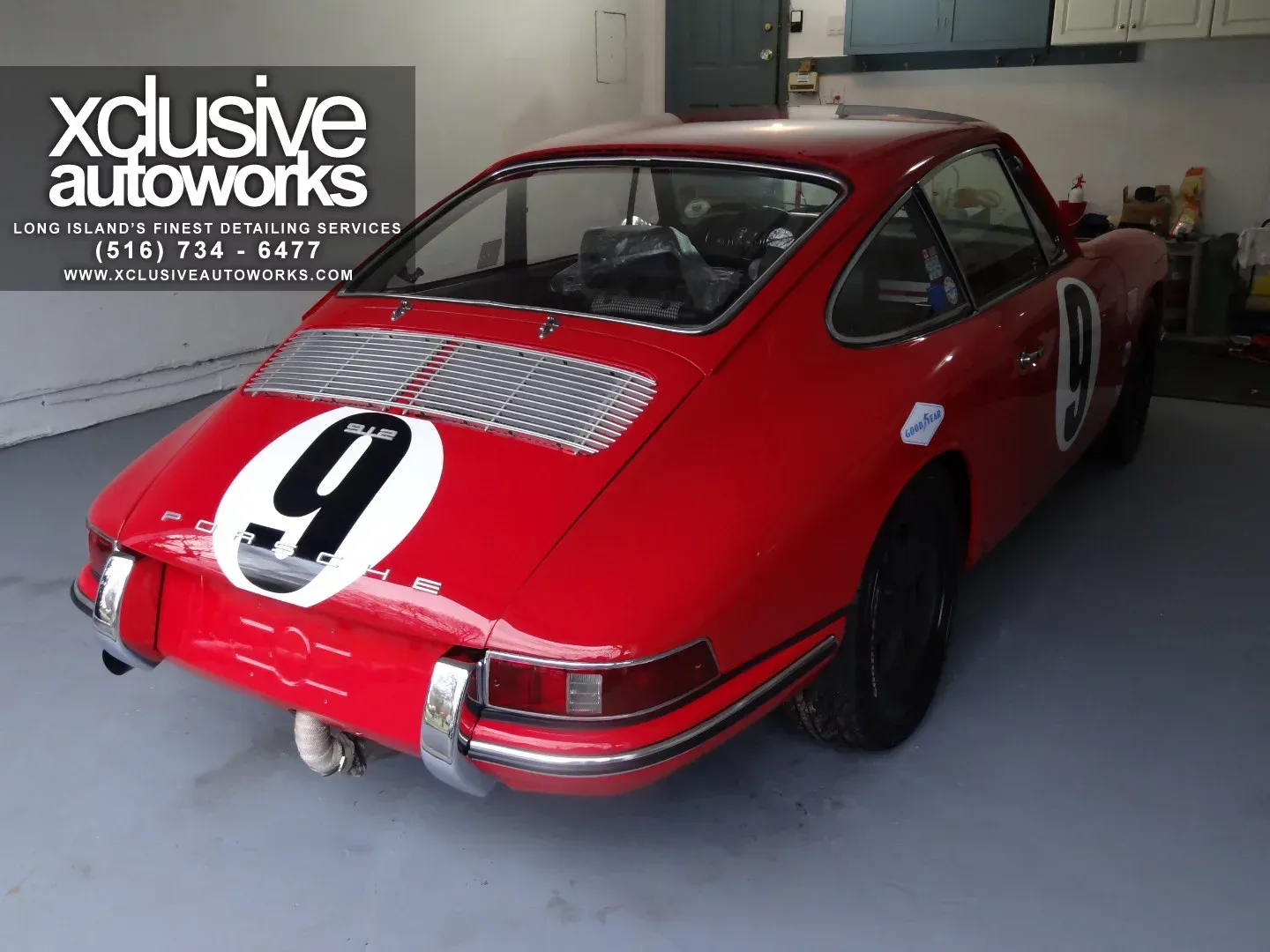 A red sports car with the number 9 on the back