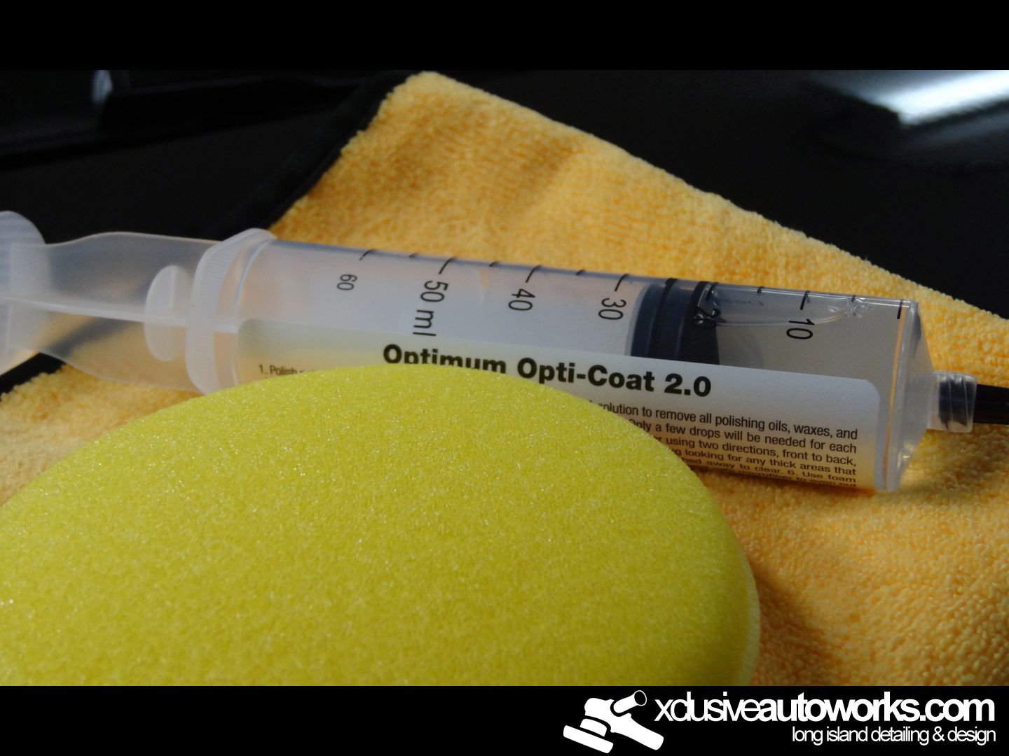 A syringe with optimum opti-coat 2.0 on it