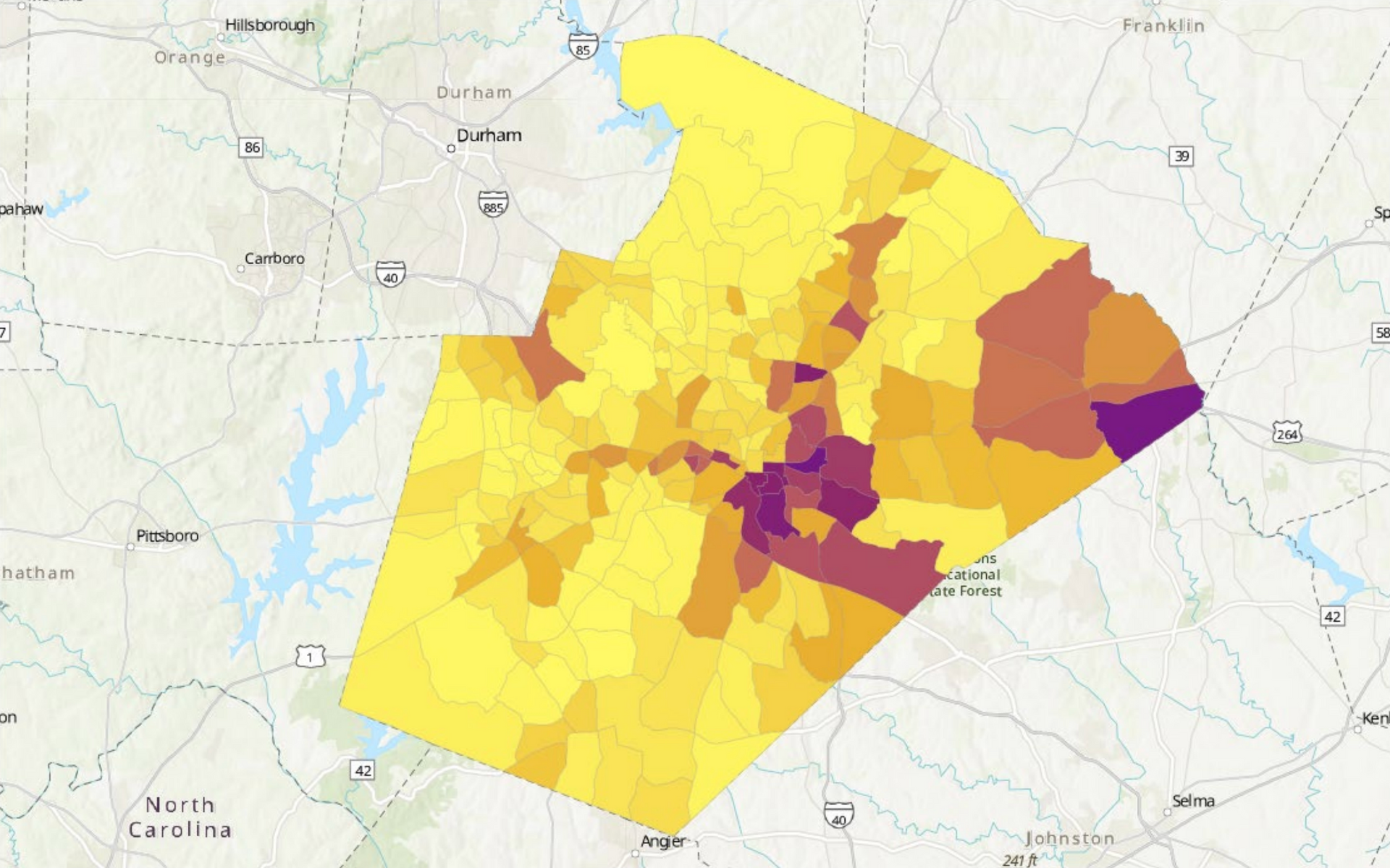 Yellow and purple shaded map overlay on a street map, showing a highlighted region with varying data intensity