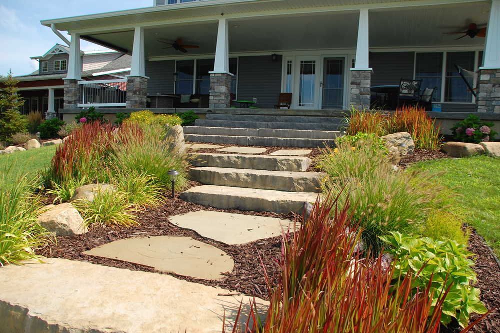 A house with stairs leading up to the front porch
