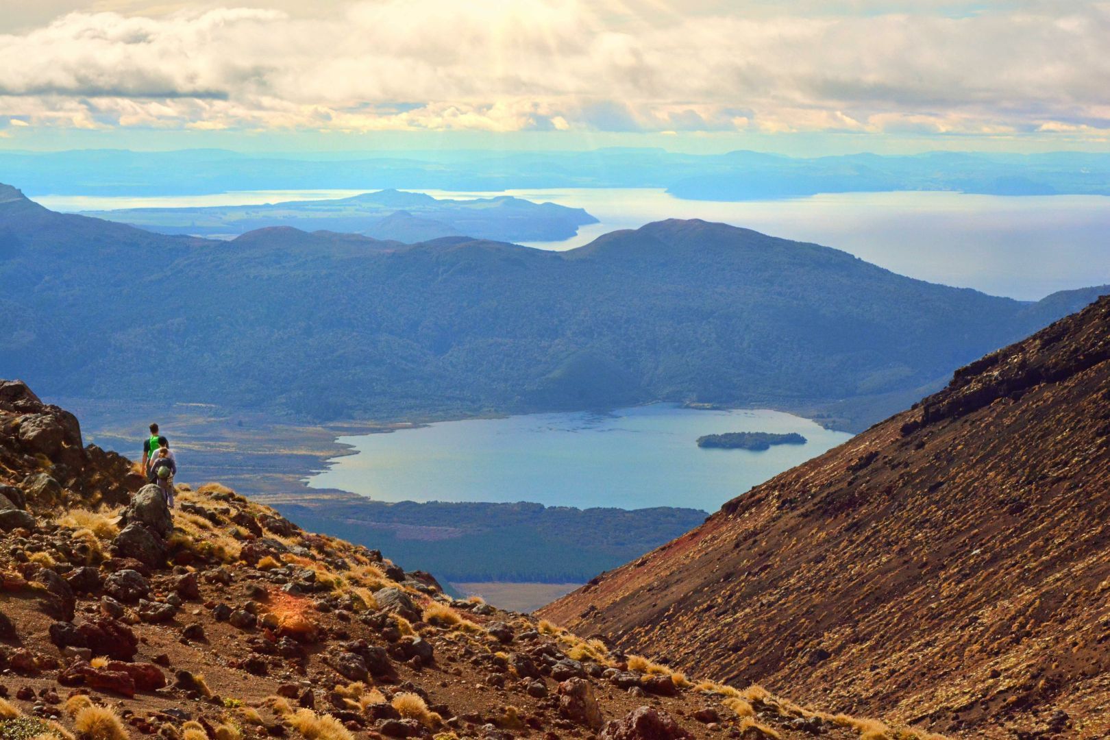 A group of hikers making their ascent on the Tongariro Alpine Crossing