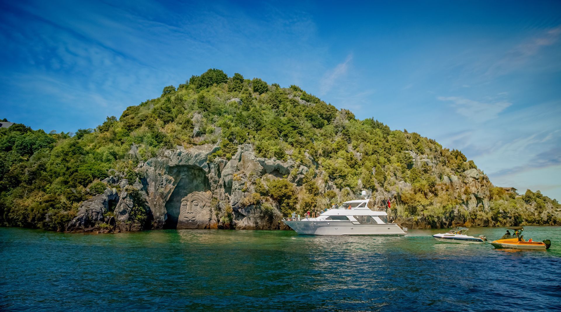 Visiting the Maori rock carvings by boat in Taupo