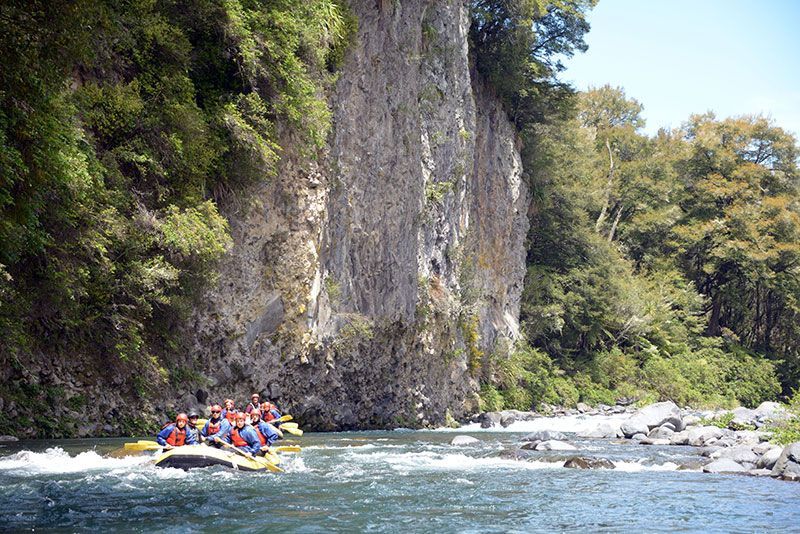 Two groups of people rafting on the Tongariro River