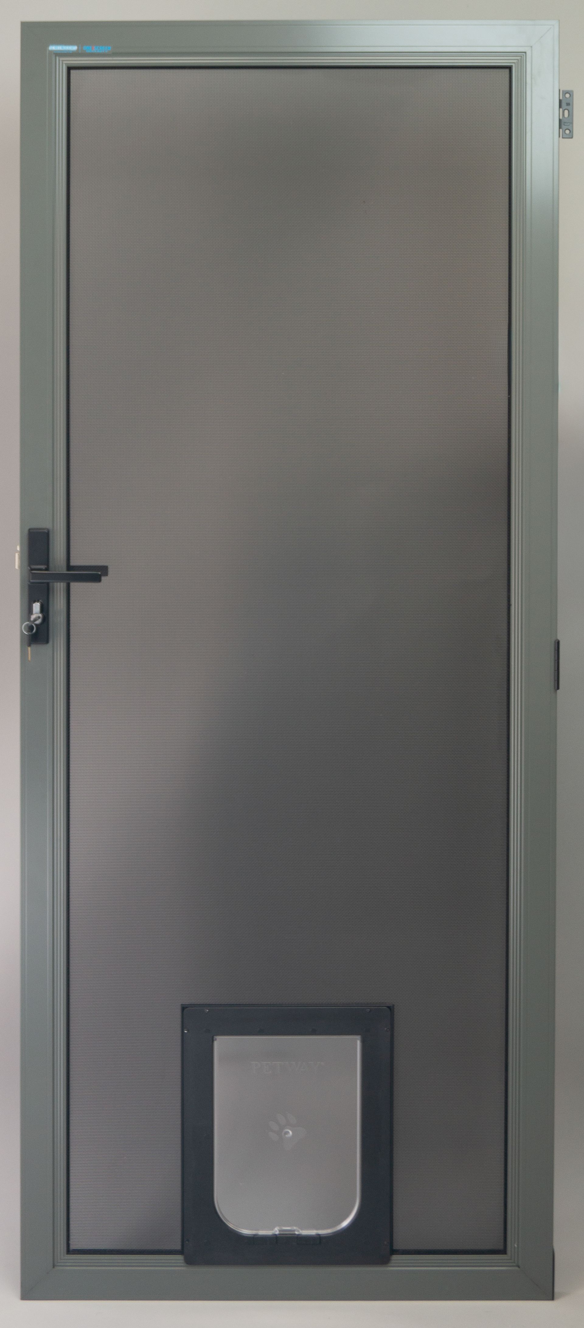 Grey metal screen door with a pet door — Everything Screendoors & More In Wollongong, NSW