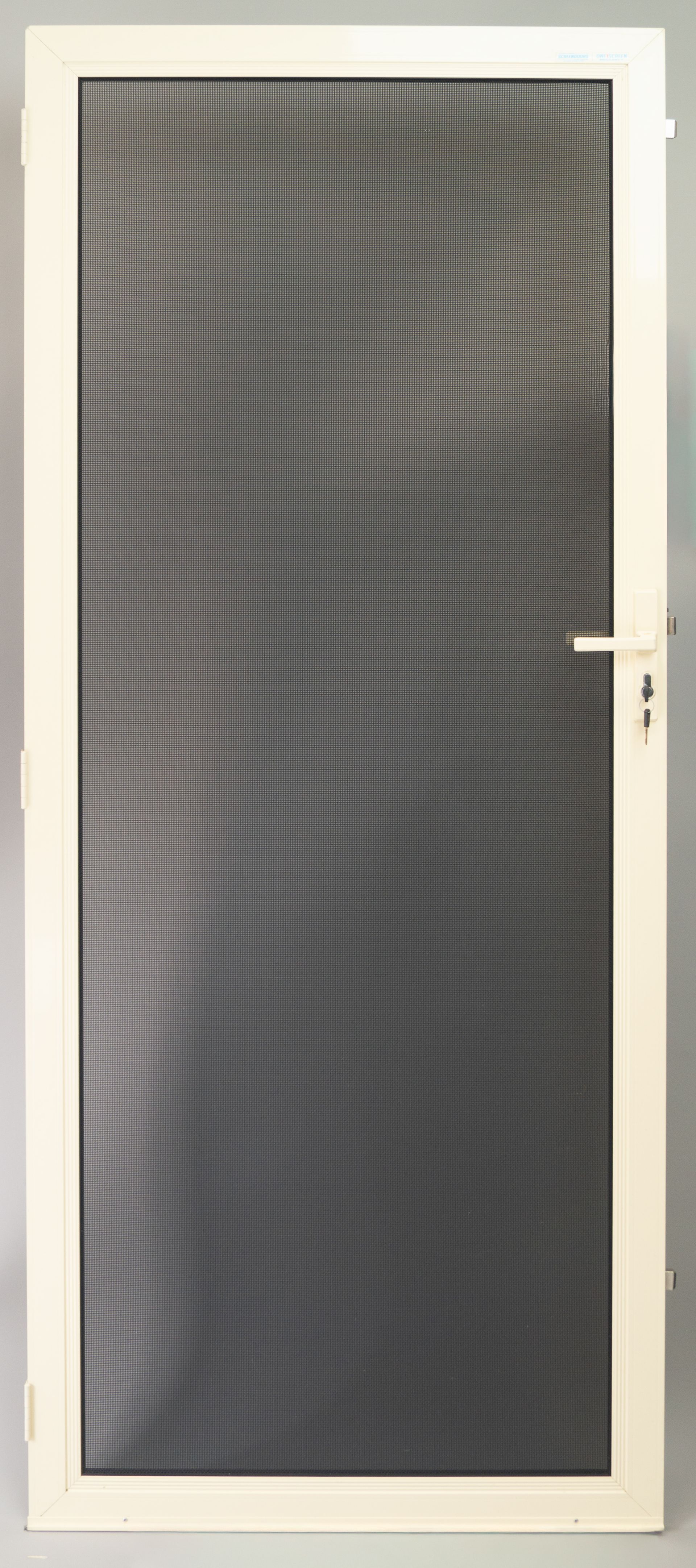 A white framed screen door with black mesh — Everything Screendoors & More In Wollongong, NSW
