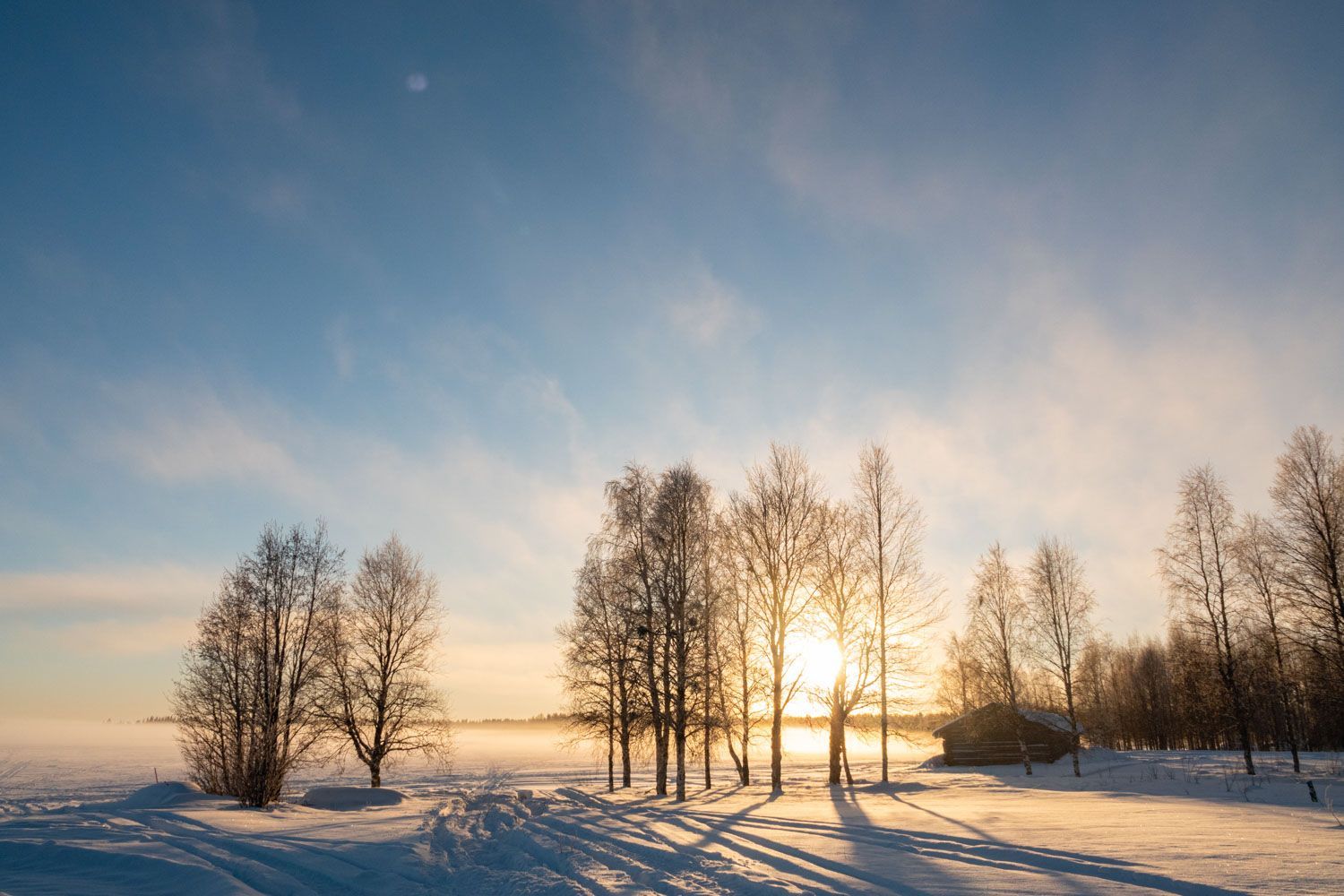 Ondergaande zon in Lapland