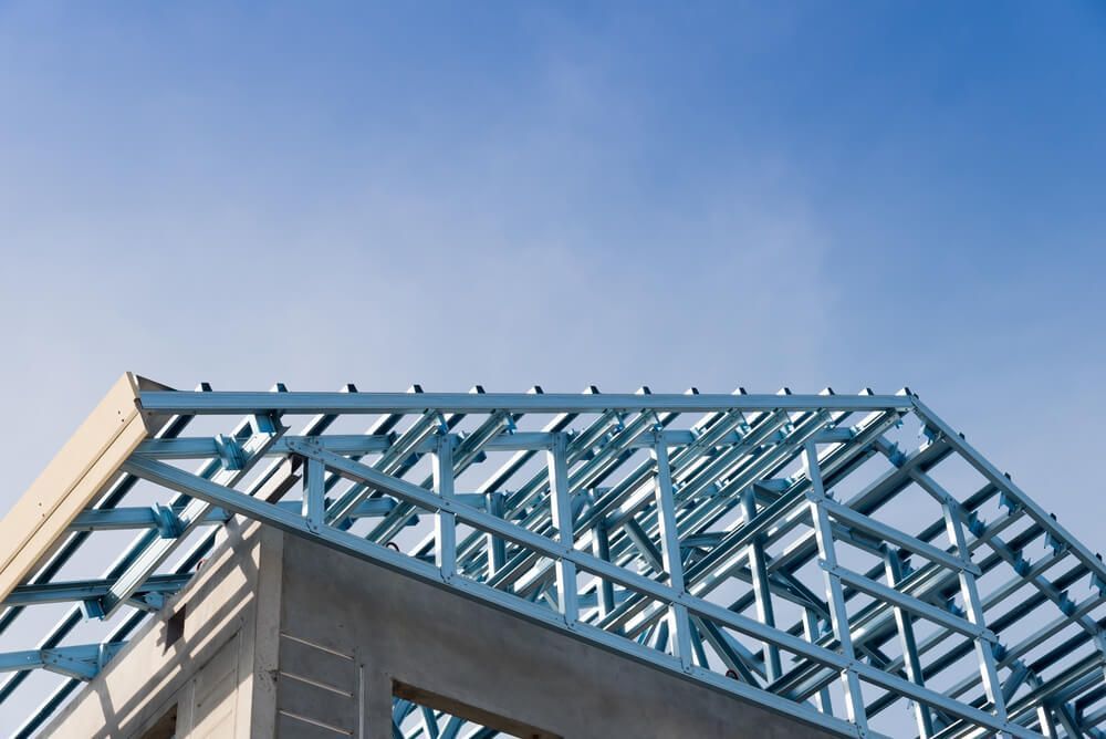 Steel Roof is Being Built With a Blue Sky — Fullerton's Plumbing Manufacture In Woree, QLD