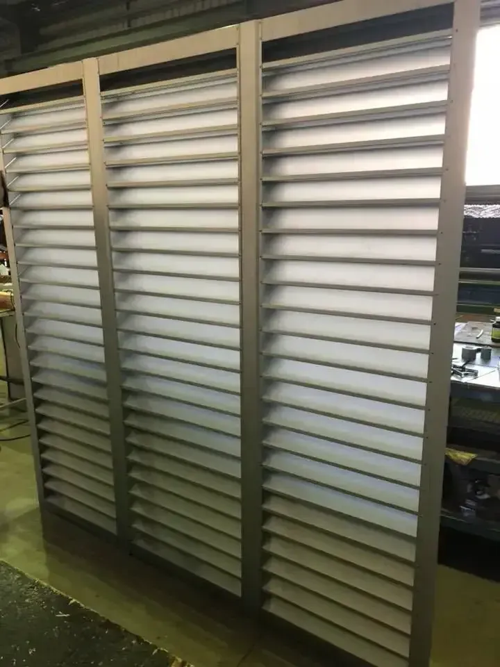 A Row of White Shutters Are Sitting Next to Each Other in a Room — Fullerton's Plumbing Manufacture In Woree, QLD