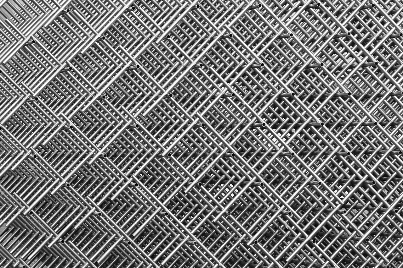 Chain-link Fence Close-up Steel Purlins — Fullerton's Plumbing Manufacture In Woree, QLD