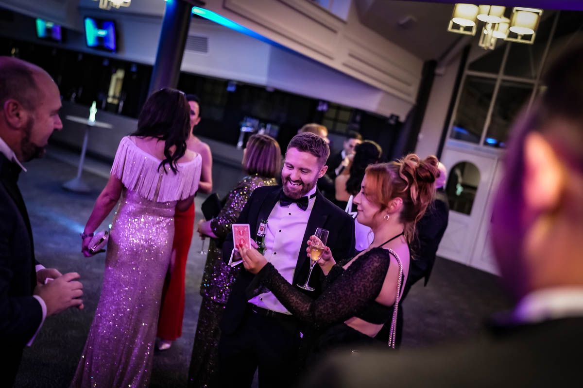 Chester Racecourse Magician Paul Roberts, having some magical fun with guests at a private event