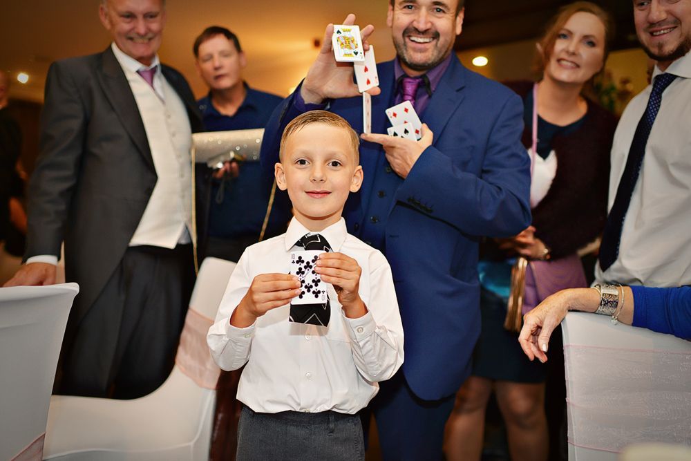 Wedding Magician Paul Roberts, making the guests day at a Mold wedding event