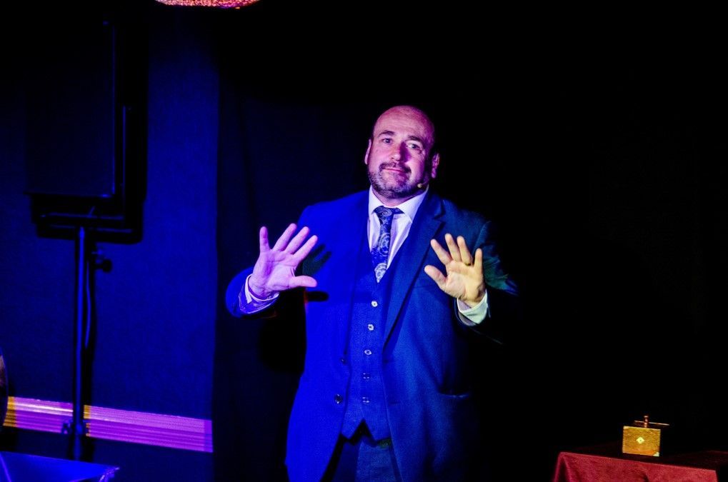Paul Roberts standing up at The Magic Bar Live Llandudno