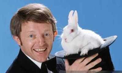 Paul Daniels performing magic