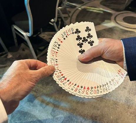 Expert Sleight of hand Magician Paul Roberts with his card fan