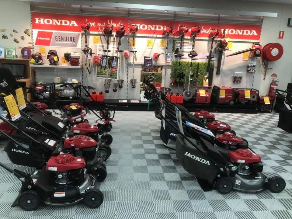 A Honda Lawn Mower is on Display in a Store — Ireland's Machinery Pty Ltd In Braemar, NSW