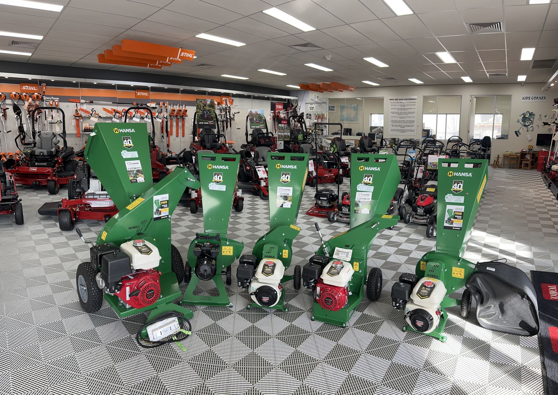 A Large Room Filled With Lots of Lawn Mower Equipment — Ireland's Machinery Pty Ltd In Braemar, NSW