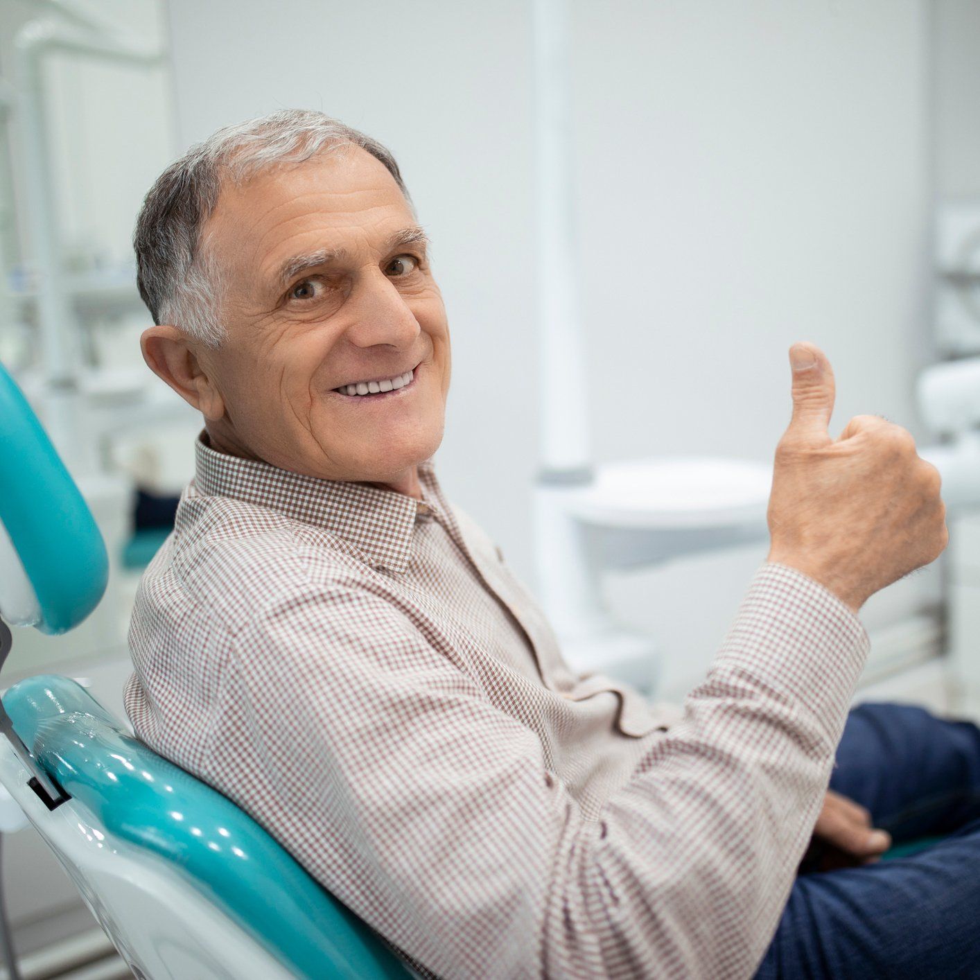 Happy Senior With Thumbs Up — Wilmington, DE — New Concept Dental Happy Senior With Thumbs Up — Wilmington, DE — New Concept Dental