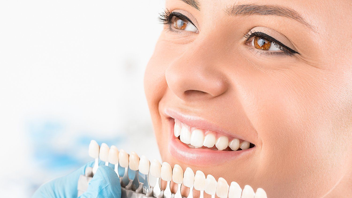 Woman With White Teeth — Wilmington, DE — New Concept Dental