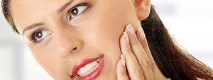 Woman With Tooth Ache — Wilmington, DE — New Concept Dental