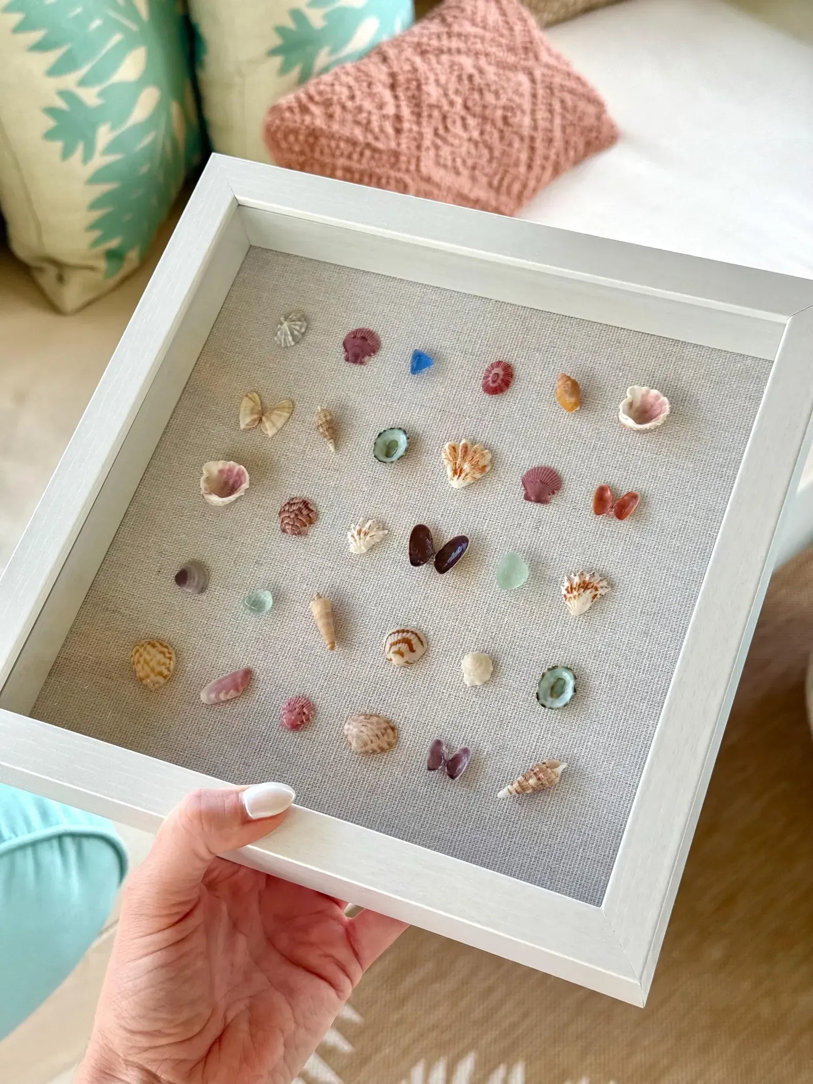 Assortment of seashells, various shapes, sizes, and colors, including white, brown, tan, and orange.