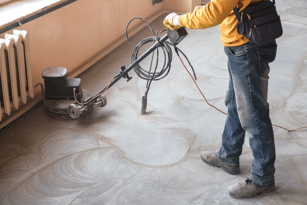 Person Using a Floor Grinder to Polish a Concrete Floor — Bowen Hire in Collinsville, QLD