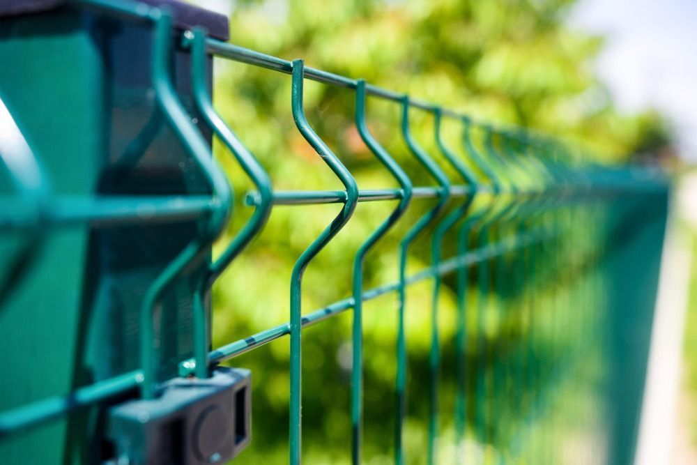 Close-up View of a Green Metal Wire Mesh Fence — Bowen Hire in Bowen, QLD