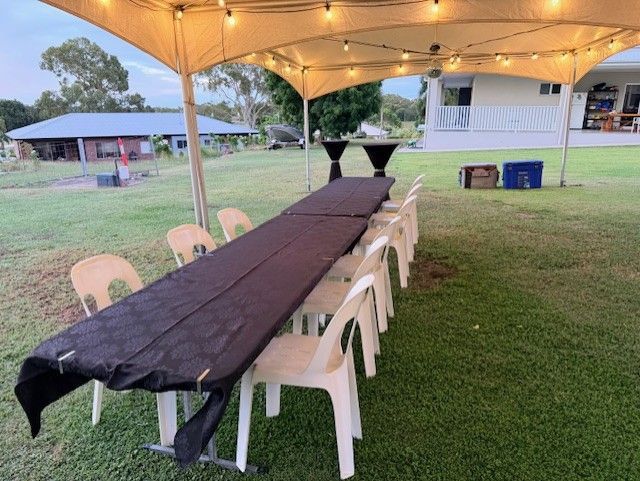Outdoor Banquet Table Under a Lit Canopy — Bowen Hire in Collinsville, QLD
