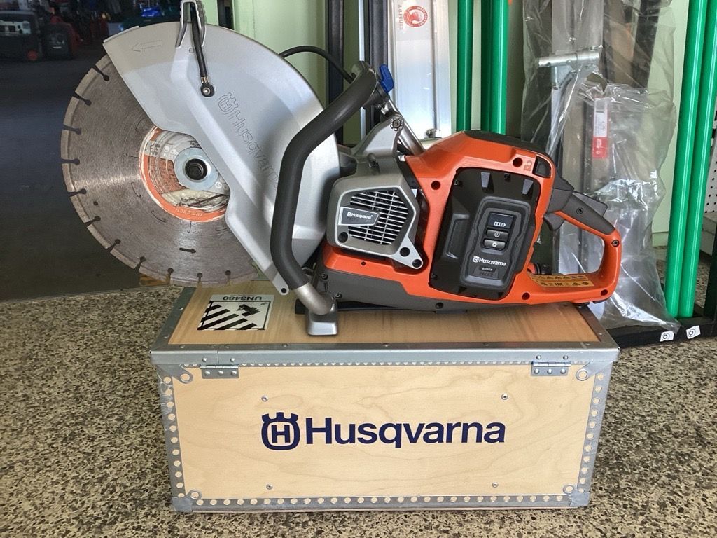 Husqvarna Cut-off Saw Displayed on a Crate in a Workshop — Bowen Hire in Bowen, QLD