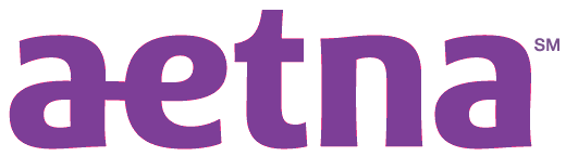 Aetna logo in purple lowercase letters with a multicolored triangle in the “t” and a light gray background