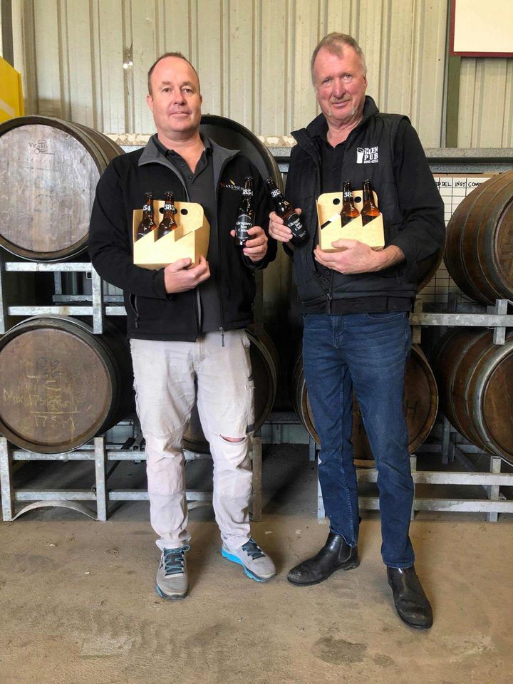 Men holding cider bottles | Glengarry, VIC | Glengarry Inn Cider