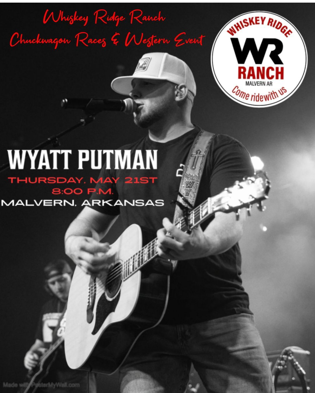 Wyatt Putman singing and playing guitar on stage at Whiskey Ridge Ranch, Malvern, Arkansas, May 21, 2023