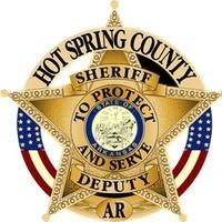 Hot Spring County Sheriff Deputy star badge with U.S. flags and “To Protect and Serve” text, AR